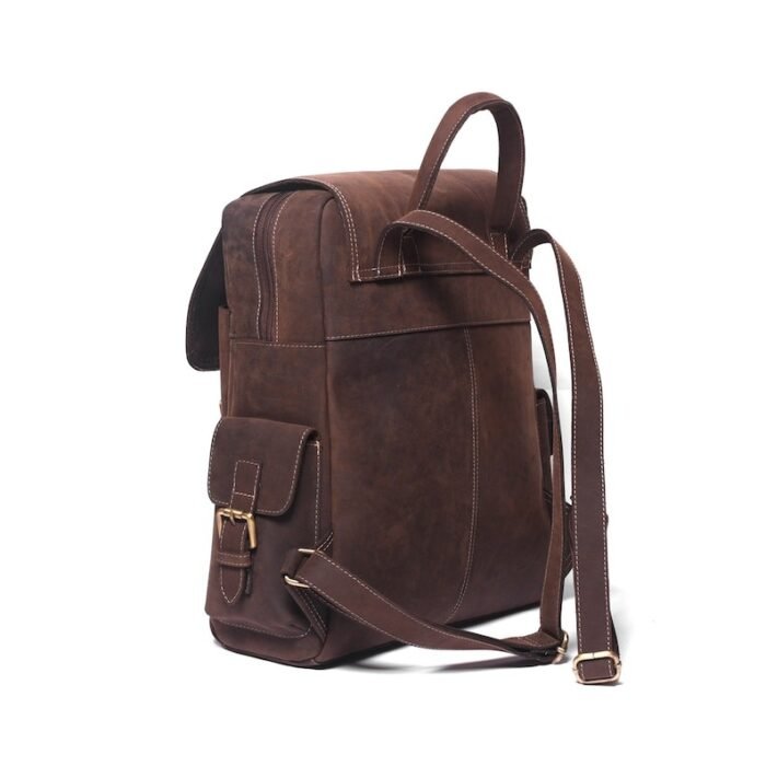 Full-grain leather Handmade rucksack Laptop compartment Adjustable straps Brass hardware