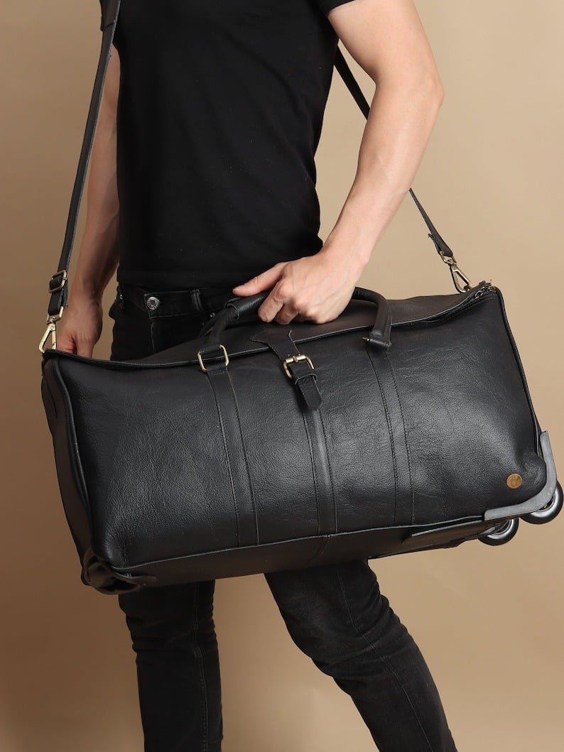 il_794xN.6290236790_9s95 Personalized Black Leather Rolling Suitcase | Handmade Wheeled Duffle Bag